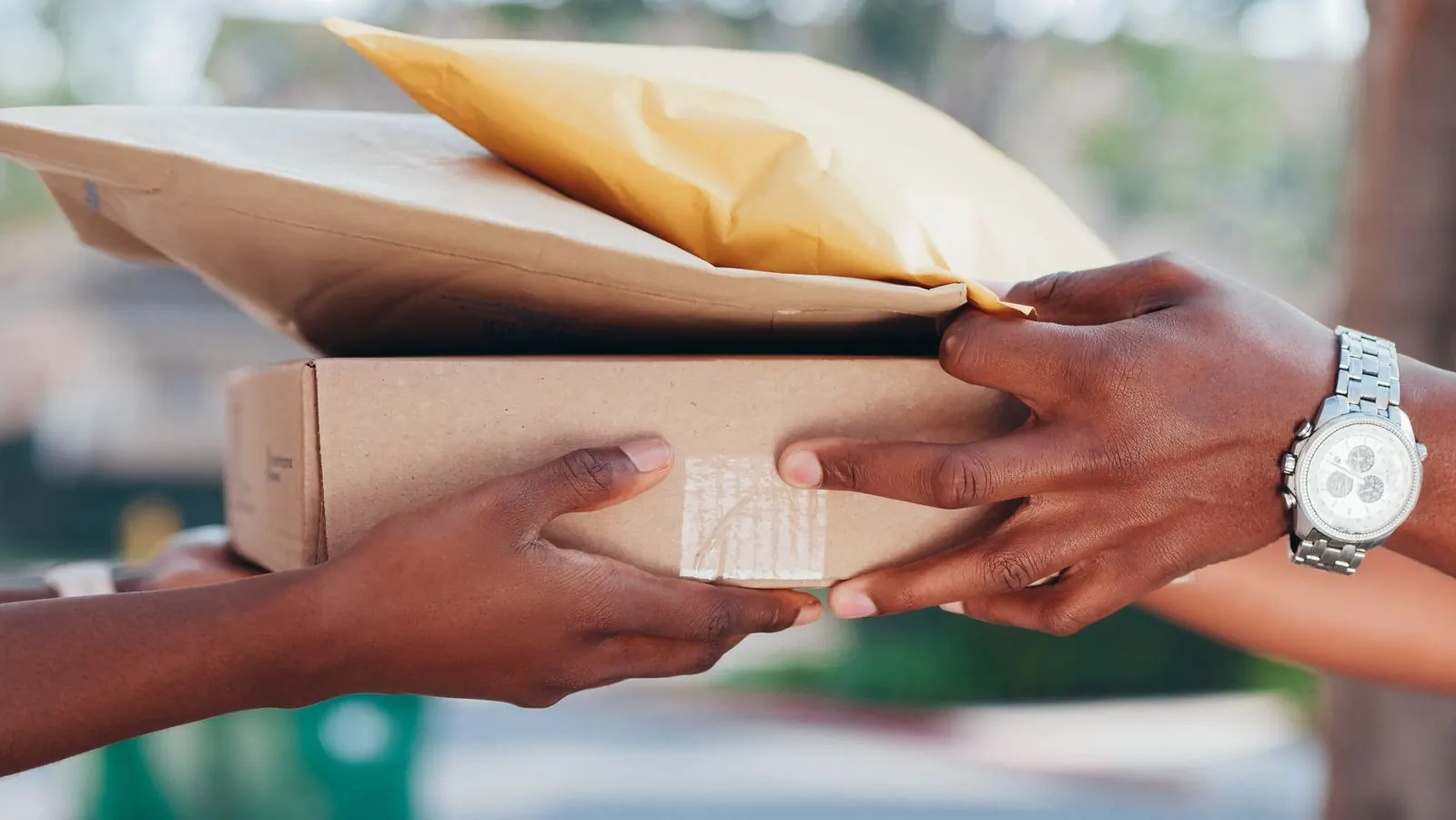 High-value parcel handed from one person to another